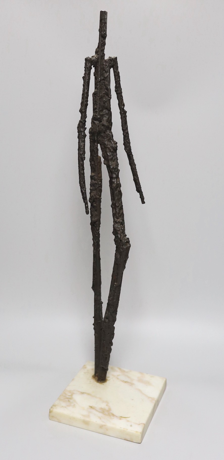 A 20th century abstract figural bronze, 63cms high